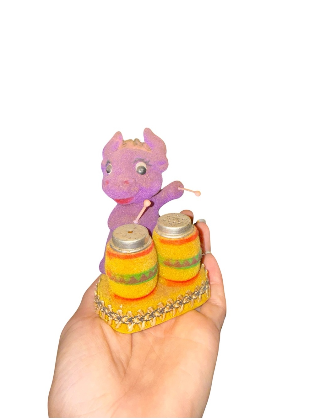 Vintage flocked animal playing drums with salt and pepper shakers